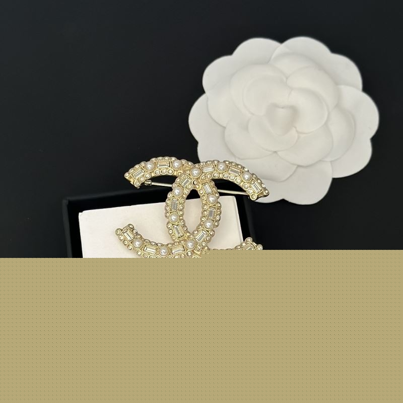 Ch*el brooches